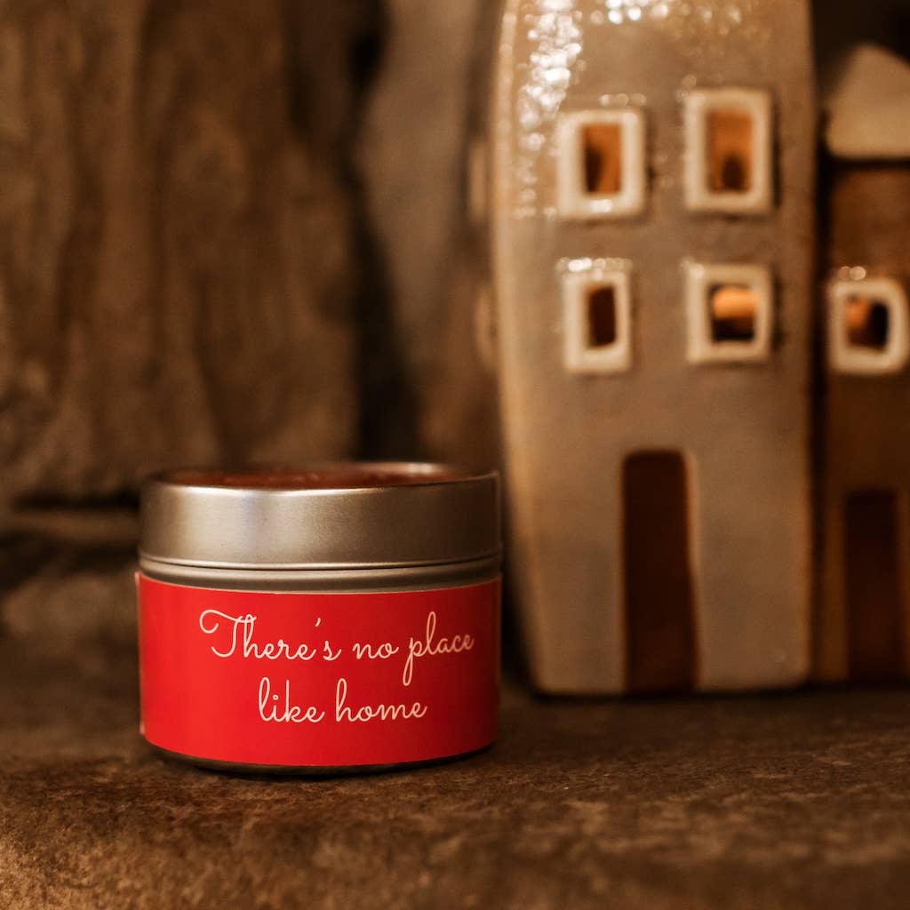 No place like home | Does unman... Bilingual Mini Tin Candle